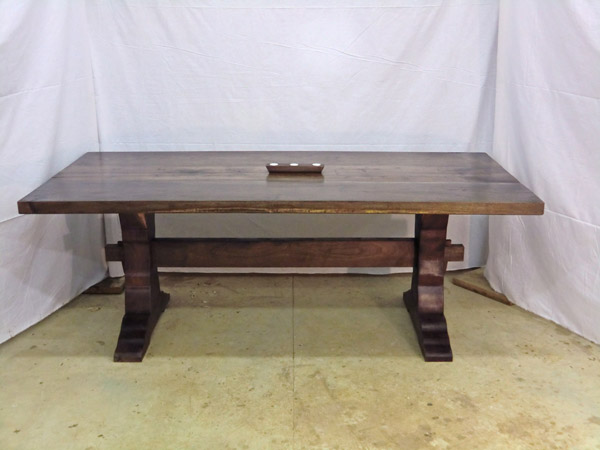walnut trestle dining table